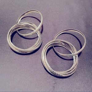 Bundle of (2) interconnected bangle bracelets